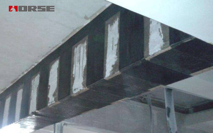 Beam bonded steel plate and FRP wrap.jpg