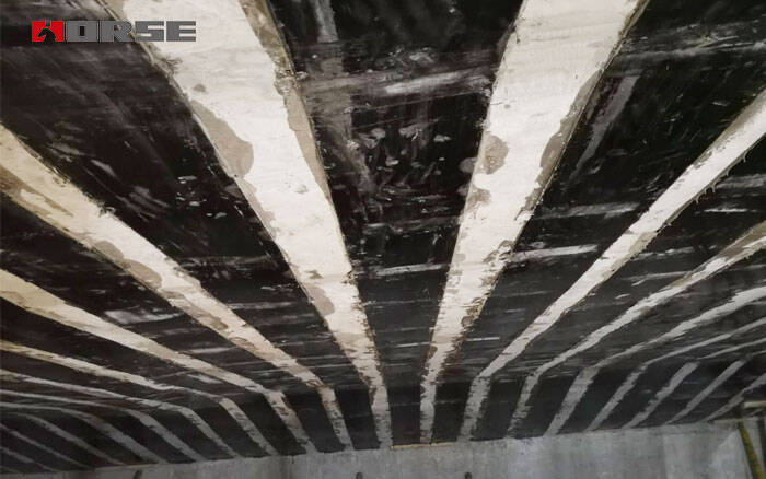 Carbon fiber plate in the reinforcement of concrete bridges