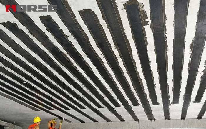 Carbon fiber retrofitting corroded reinforced concrete structures