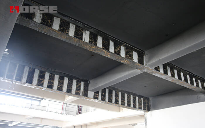 Externally bonding carbon fiber wrap in strengthening concrete