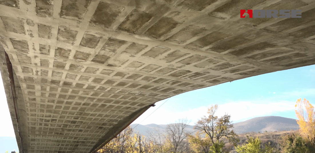 Reinforced Exposed Concrete Bridge With Carbon Fiber Laminate