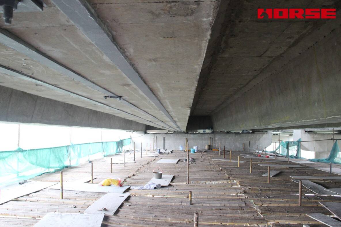 Pre-stress Carbon Fiber Laminates "Lock" Concrete Cracks