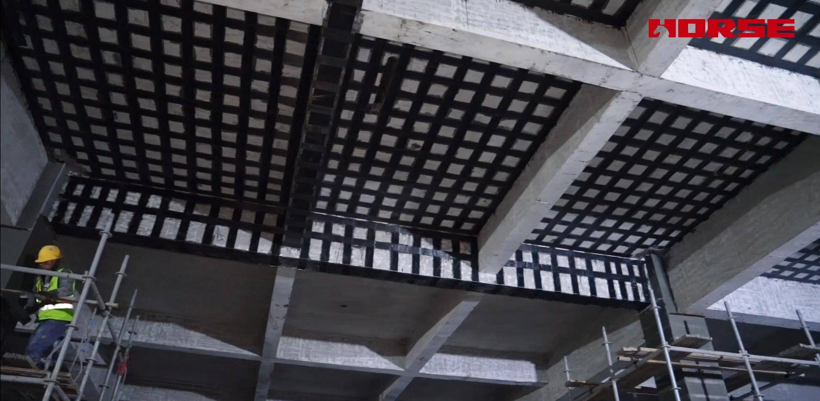 Post-Fire Structural Restoration with CFRP Reinforcement