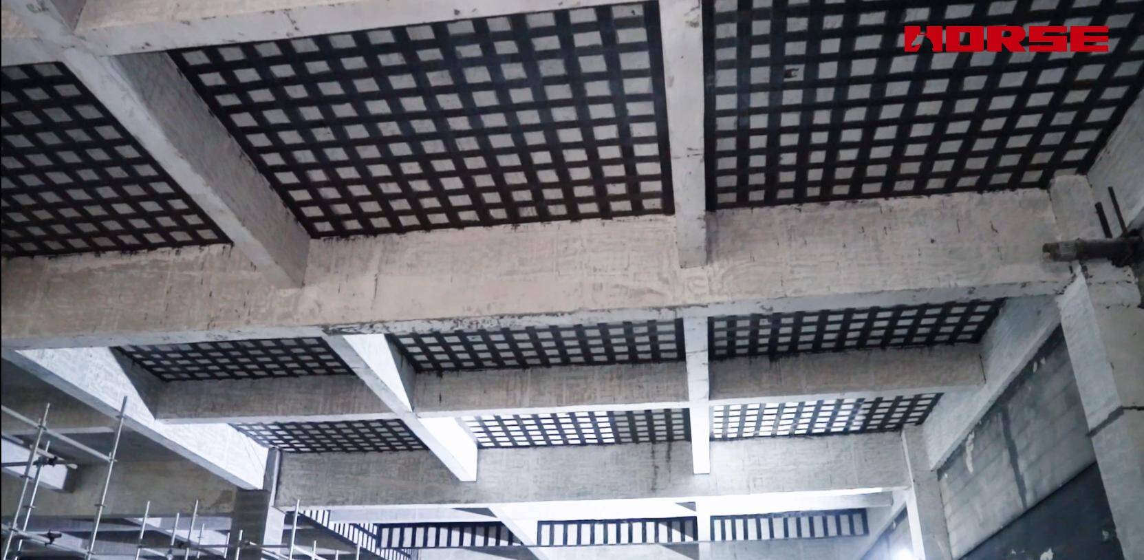 Post-Fire Structural Restoration with CFRP Reinforcement