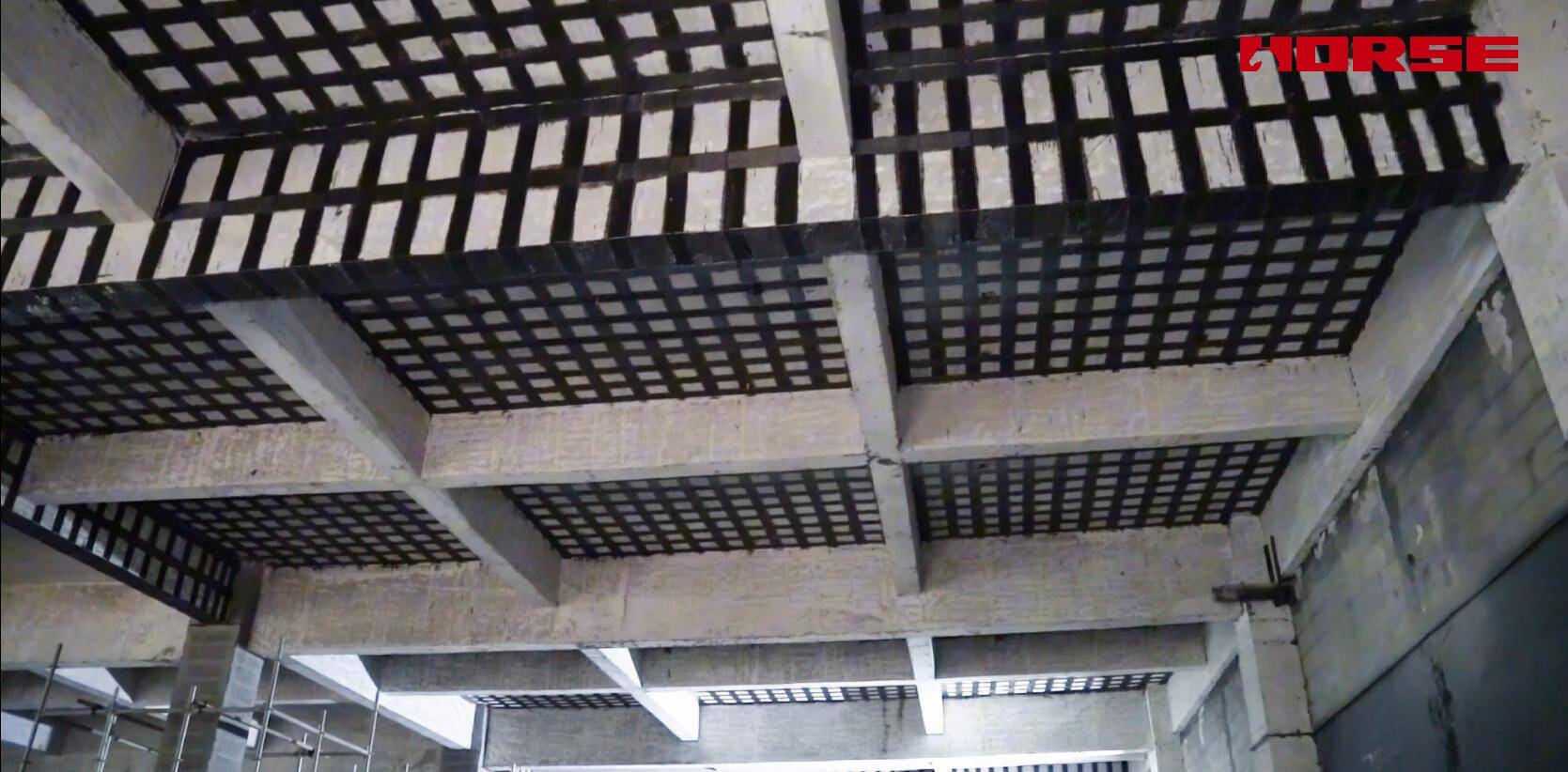 Post-Fire Structural Restoration with CFRP Reinforcement