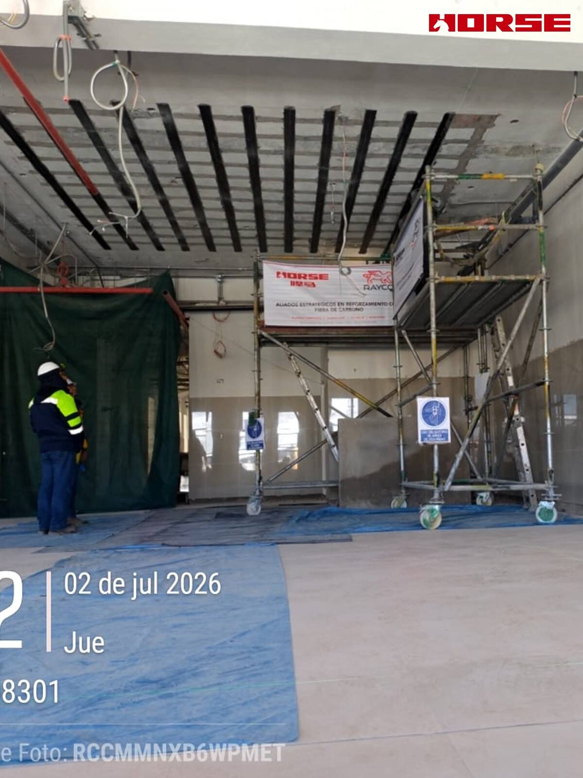Carbon Fiber Plate Strengthening of RC Slabs with Openings