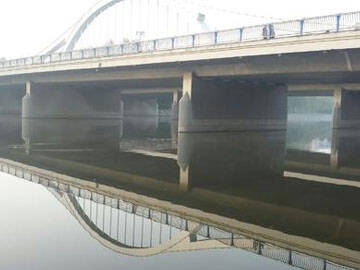 Carbon fiber reinforcement of existing overrun bridge